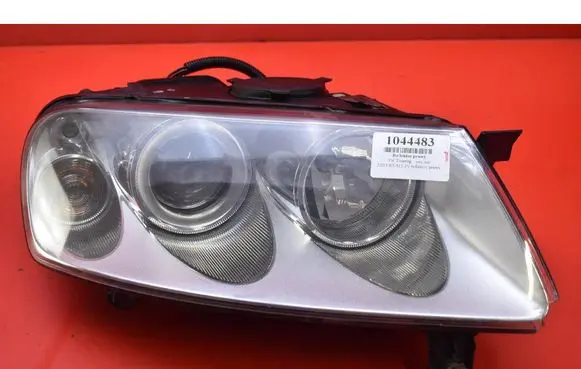 Volkswagen Touareg I Headlight/headlamp 7L6941016CE