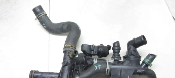 Thermostat/thermostat housing