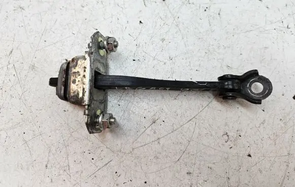 Subaru Legacy Rear door check strap stopper