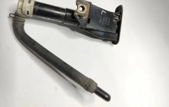 Mitsubishi Pajero Headlight washer spray nozzle 87873