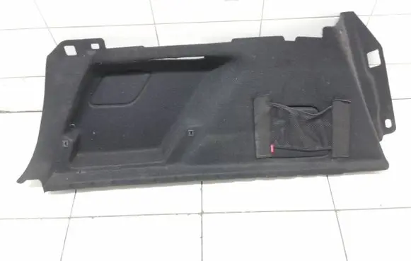Trunk/boot lower side trim panel