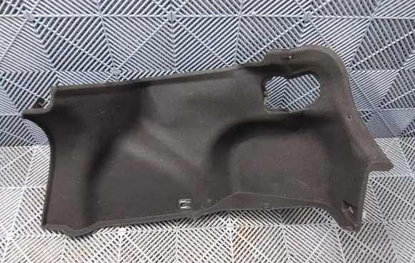 Trunk/boot lower side trim panel