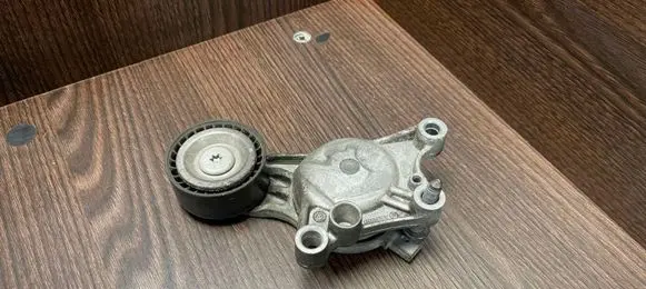 Peugeot Partner Generator/alternator belt tensioner 9807720180