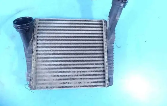 Volkswagen Touareg II Intercooler radiator 7P0145804A IMPRK1334923