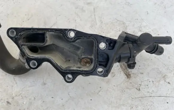 Thermostat/thermostat housing