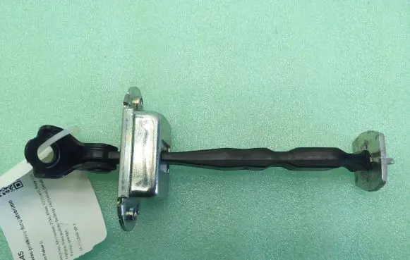 Nissan Pulsar Front door check strap stopper