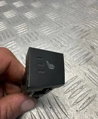Seat heating switch