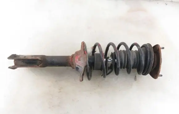Toyota Yaris Front shock absorber with coil spring