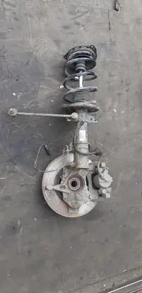 Front wheel hub spindle knuckle