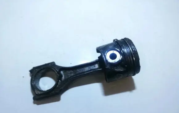 Piston with connecting rod