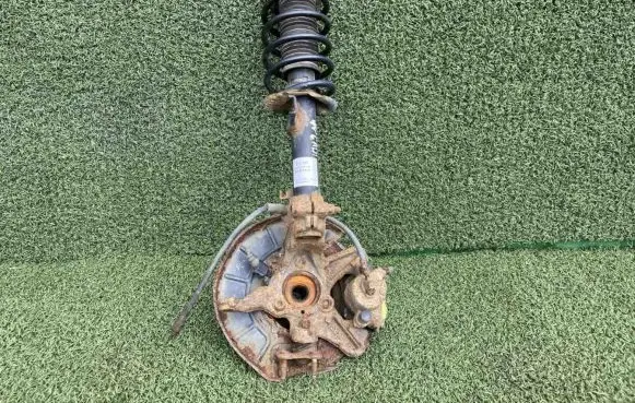 Volkswagen Caddy Front wheel hub spindle knuckle 1K0407256T 1K0615124D