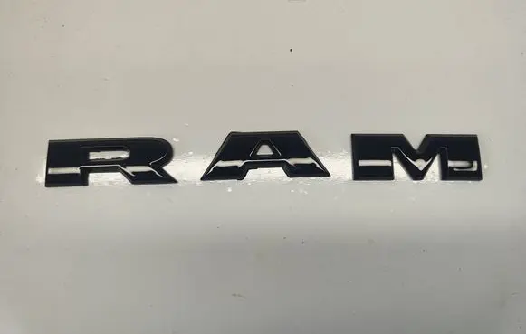 Dodge RAM Front door emblem/model letters 68309785AB 68309785AA