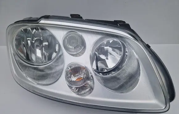 Volkswagen Touran I Headlight/headlamp 1T0941006D