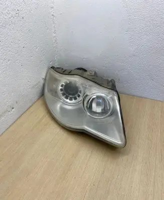 Volkswagen Touareg I Headlight/headlamp 7L6941032 24702302000023 1EL24703202