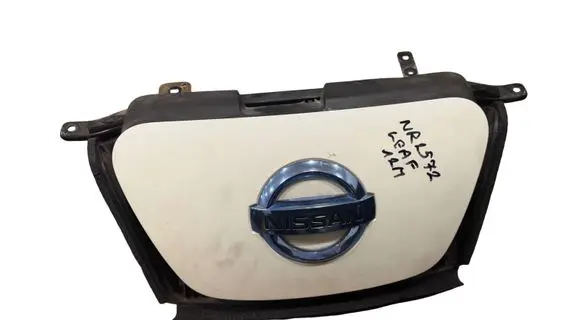 Nissan Leaf I (ZE0) Electric car charge socket cover 657303NA3A