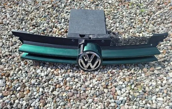 Volkswagen Golf IV Front bumper upper radiator grill 1J853655