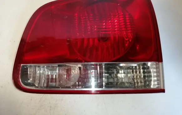 Volkswagen Touareg I Tailgate rear/tail lights 7L6945094H