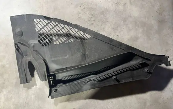 Engine bonnet/hood lock trim molding