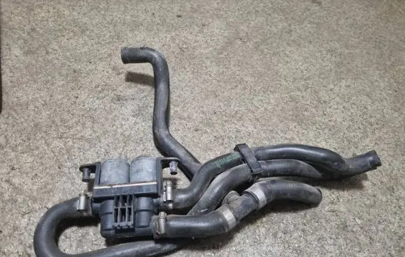 Coolant heater control valve