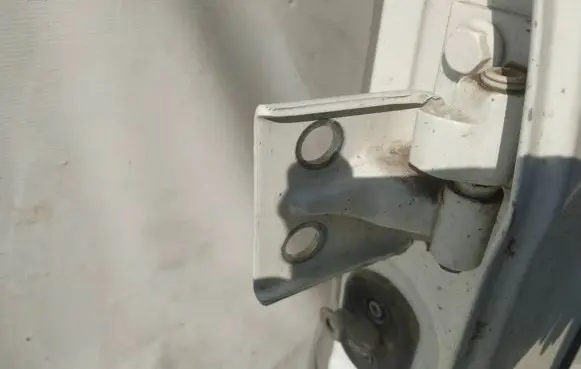Rear door lower hinge