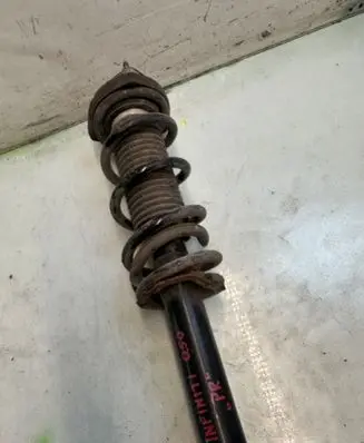Infiniti Q50 Front shock absorber with coil spring 32312