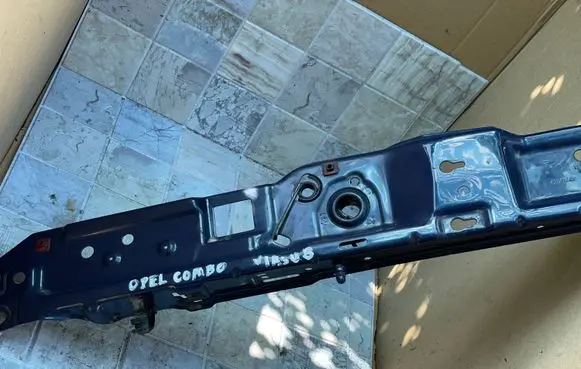 Top upper radiator support slam panel