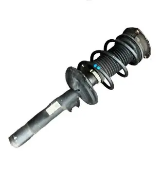 Volkswagen Golf VII Front shock absorber with coil spring 5Q0413023FJ