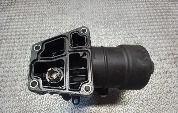 Volkswagen Caddy Engine oil radiator 03L117021C