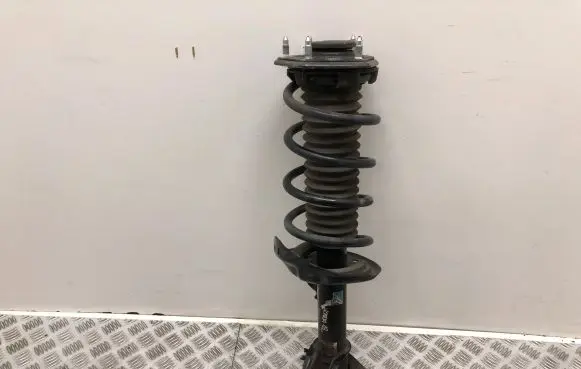 Front shock absorber with coil spring