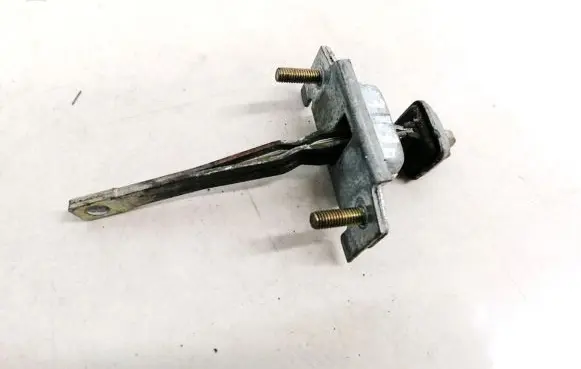 Mazda 323 F Rear door check strap stopper
