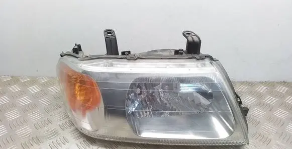 Mitsubishi Pajero Sport I Headlight/headlamp 10087415