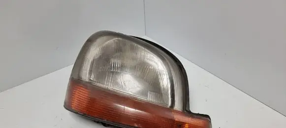 Renault Kangoo I Headlight/headlamp 7701044038