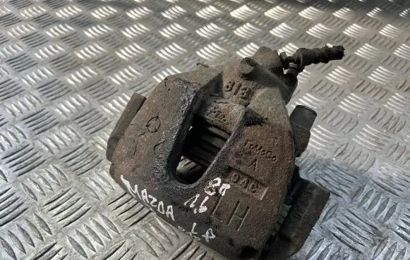 Mazda 3 II Front brake caliper
