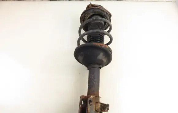 Subaru Forester SF Front shock absorber with coil spring