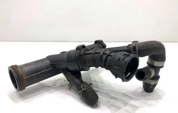 Volkswagen Golf VII Engine coolant pipe/hose 04L121071E
