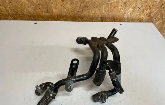 Volkswagen Golf VII Engine coolant pipe/hose 04L121064AC