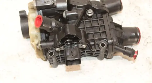 Thermostat/thermostat housing