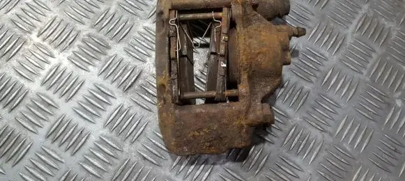 Mazda Demio Front brake caliper