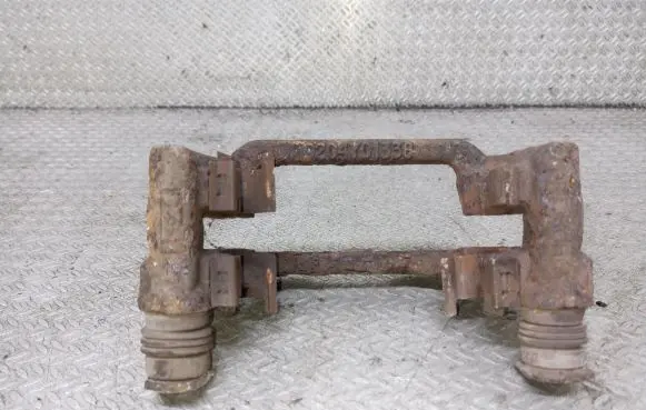 Toyota Avensis T250 Brake caliper pad carrier rear 