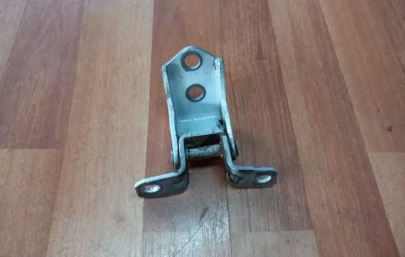 Front door lower hinge