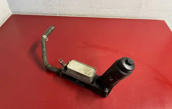 Chrysler Town u0026 Country V Oil filter mounting bracket 05184294AE