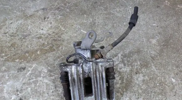 Volkswagen Jetta VI Brake caliper pad carrier rear 