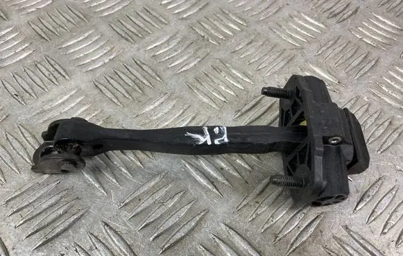 Front door check strap stopper