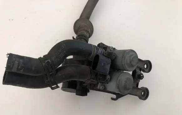 Coolant heater control valve