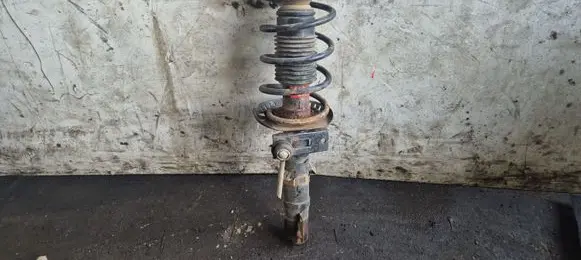 Front shock absorber with coil spring
