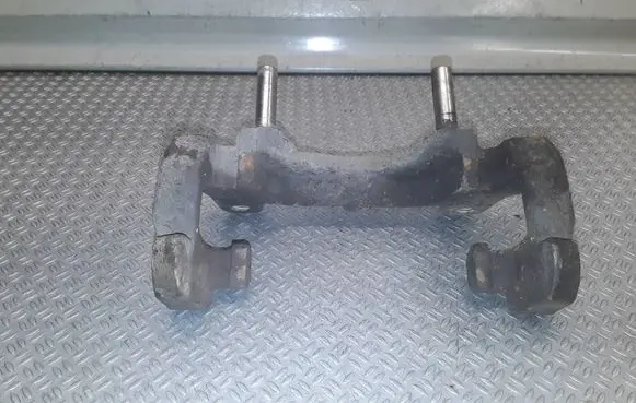 Volvo S80 Front Brake Caliper Pad/Carrier 