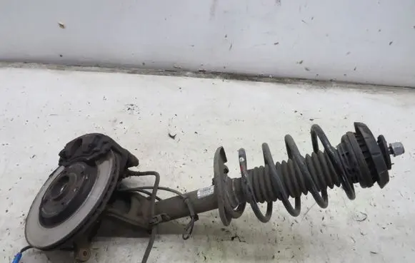 Peugeot 208 Front shock absorber with coil spring 9806007480