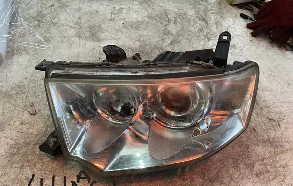 Mitsubishi L200 Headlight/headlamp 1297607000