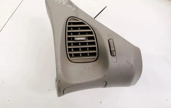 Nissan Almera Tino Dash center air vent grill 68210BU200 K10281