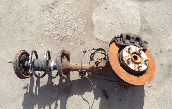 Front wheel hub spindle knuckle